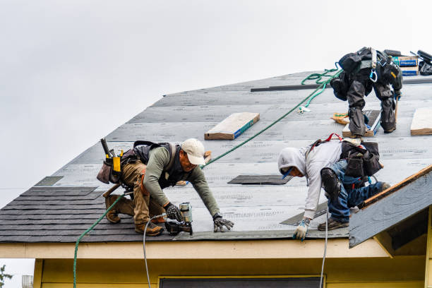 Professional Roof Replacement technician working in Voluntown, CT